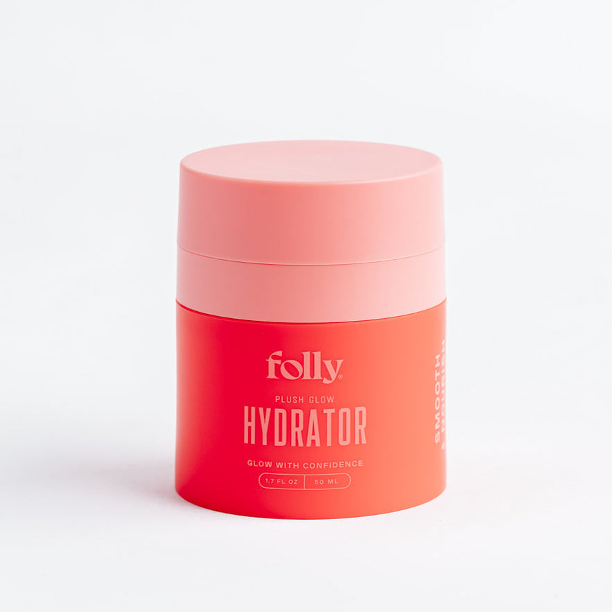 Plush Glow Hydrator peptide face moisturizer in a coral 50 mL jar with pink lid, Folly Skincare
